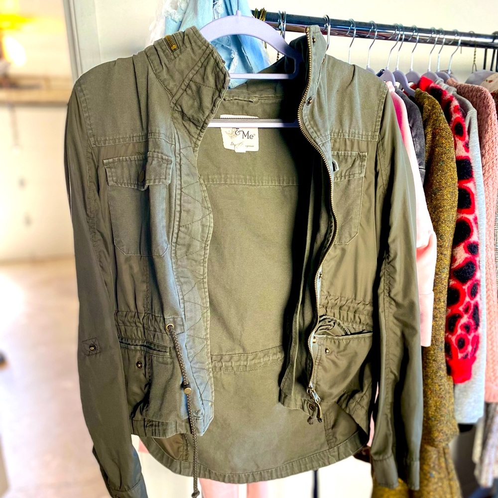 Green army jacket. Size small in woman’s, could fit a small child (oversized)